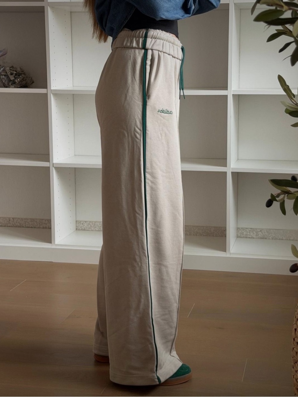 adidas women’s Wide-Leg Track Pants in Beige with Dark Green Side Stripes